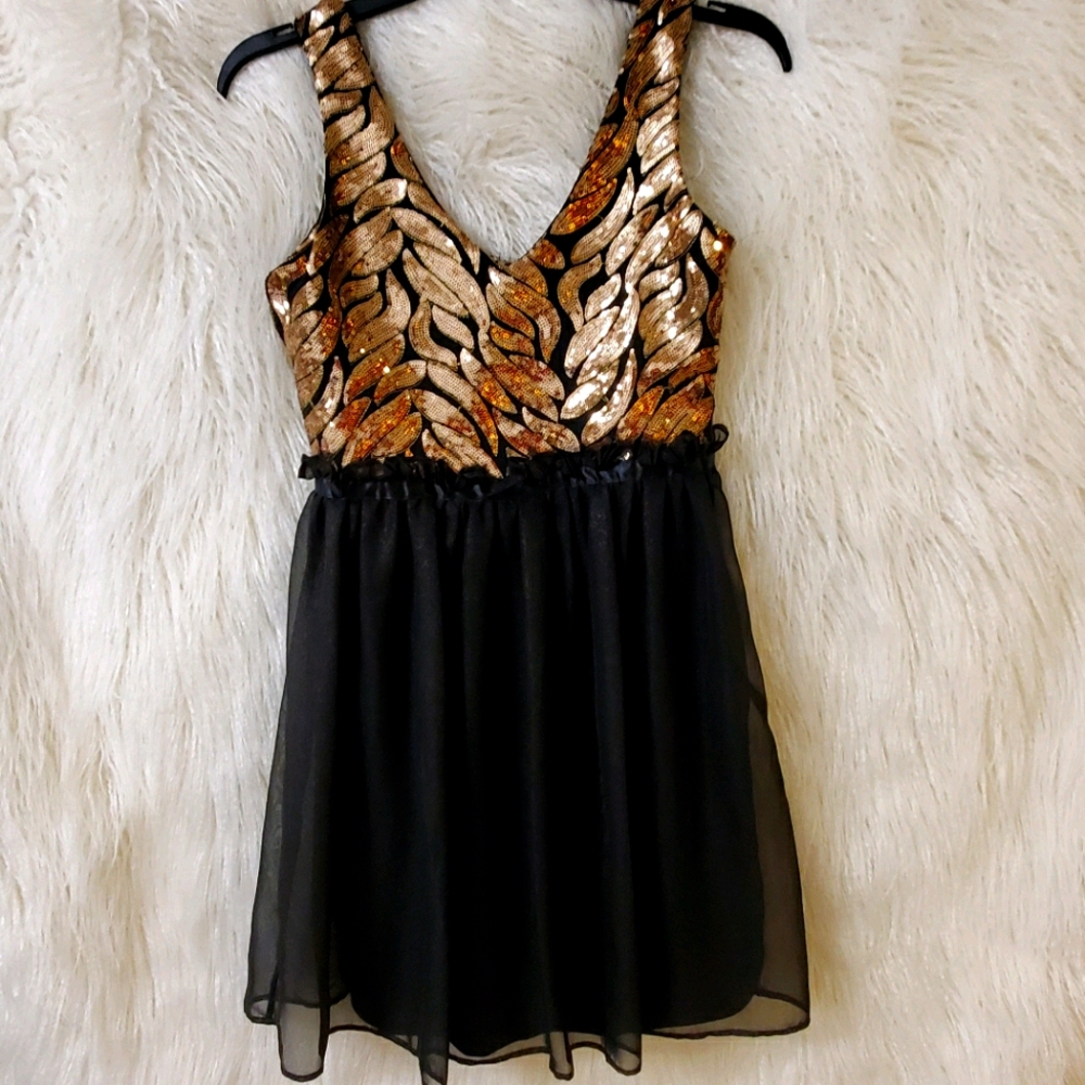 Gold and black mini dress